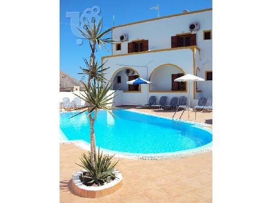 Отели на побережье Квартиры номеров Lonja Studios Santorini Перисса Греции...